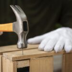 side-view-hand-holding-hammer (1)