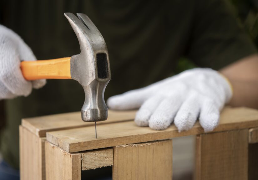 side-view-hand-holding-hammer (1)